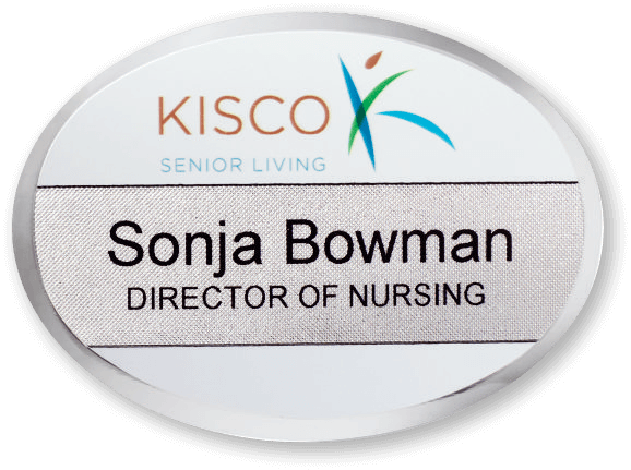 Silver metal beveled oval name tag with the name Sonja Bowman