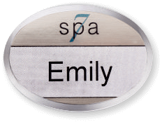 Silver oval beveled name tag with the name Emily