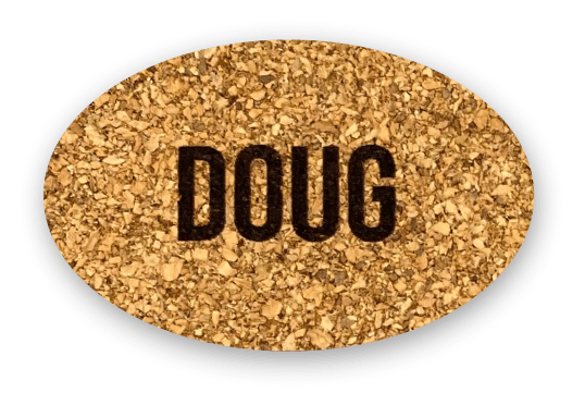 Oval cork name tag with the name Doug