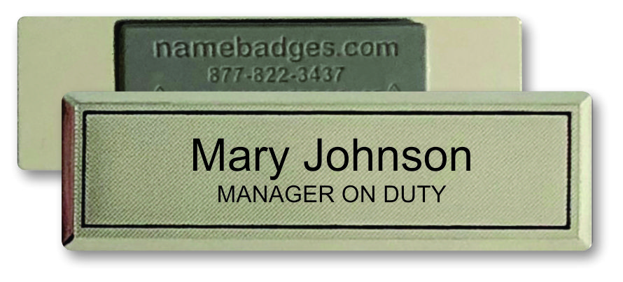 Front and back view of a gold metal bar name tag that says Mary Johnson Manager on Duty
