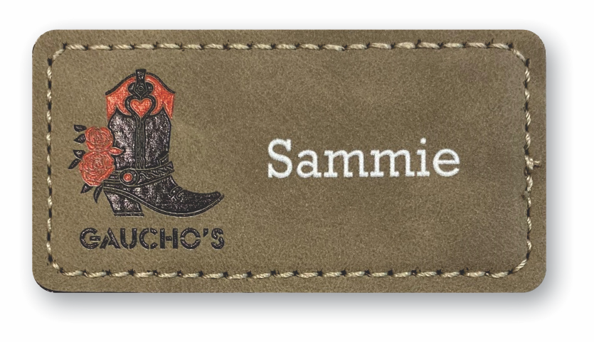 Brown leather rectangle name tag with a cowboy boot on it